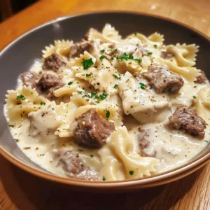 Close-up of Creamy Beef and Bowtie Pasta showing the cheesy sauce coating each bowtie noodle perfectly